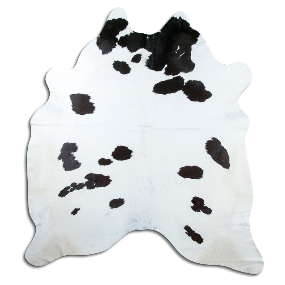 Zwart-witte koeienhuid, ongeveer 220 × 210 cm, van bovenaf gezien: precies de huid die je ontvangt