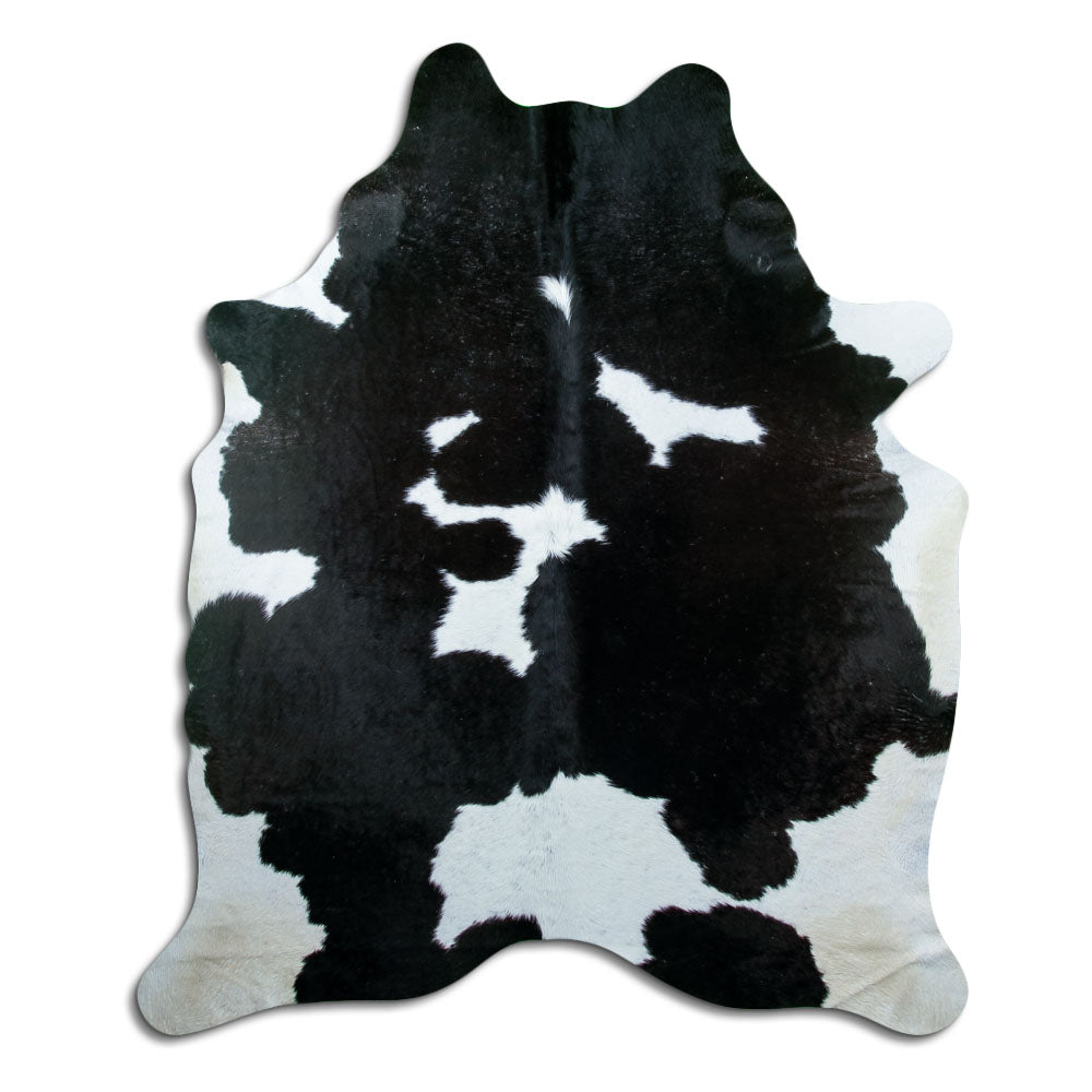 Zwart-witte koeienhuid, ongeveer 220 × 190 cm, van bovenaf gezien: precies de huid die je ontvangt