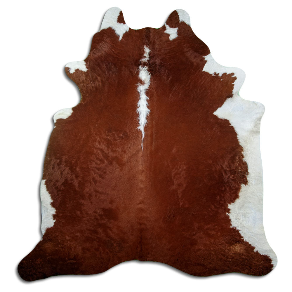 Bruin-witte koeienhuid, ongeveer 210 × 200 cm, van bovenaf gezien: precies de huid die je ontvangt