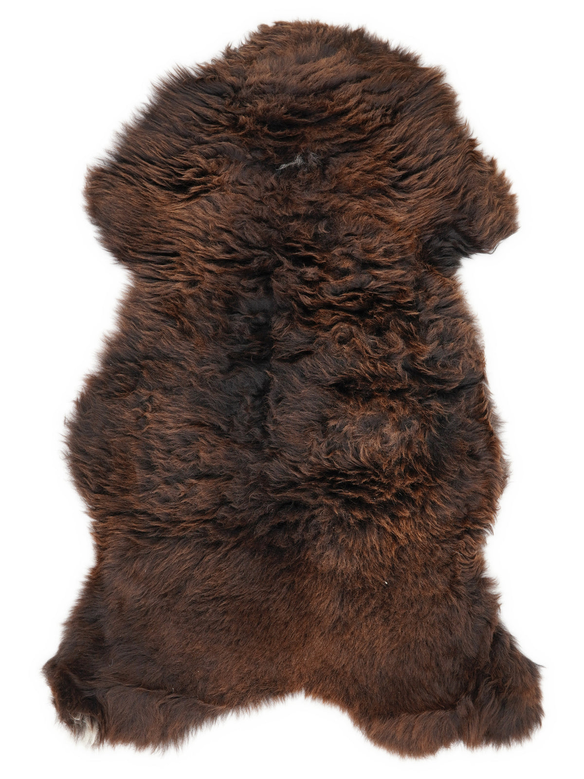 Bruine schapenvacht, ongeveer 120 × 65 cm, van bovenaf gezien: precies de vacht die je ontvangt