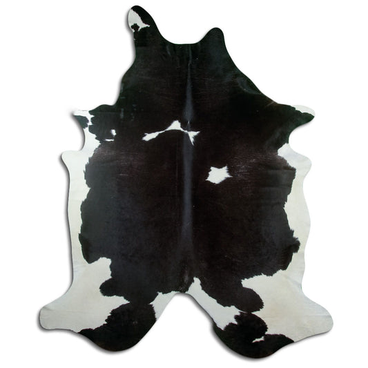 Zwart-witte koeienhuid, ongeveer 250 × 220 cm, van bovenaf gezien: precies de huid die je ontvangt
