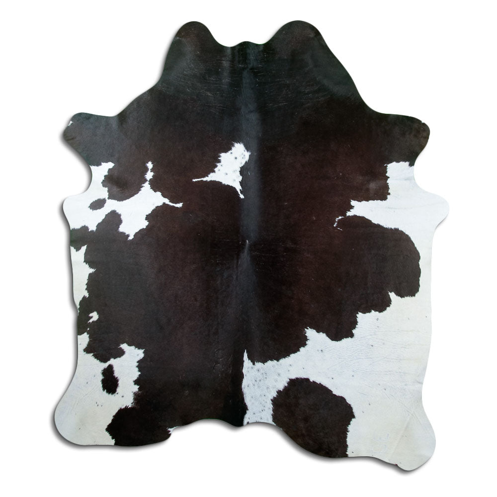 Zwart-witte koeienhuid, ongeveer 200 × 180 cm, van bovenaf gezien: precies de huid die je ontvangt