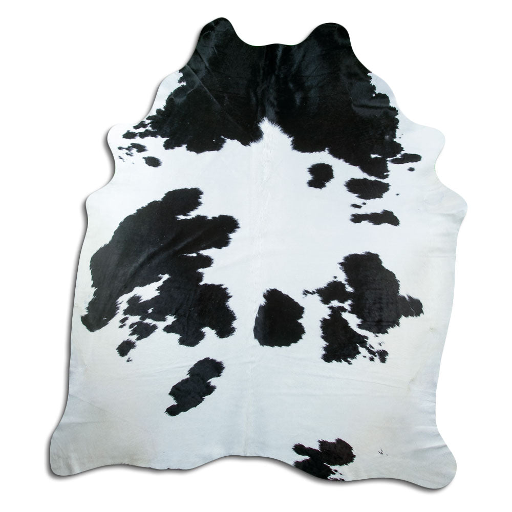 Zwart-witte koeienhuid, ongeveer 240 × 210 cm, van bovenaf gezien: precies de huid die je ontvangt