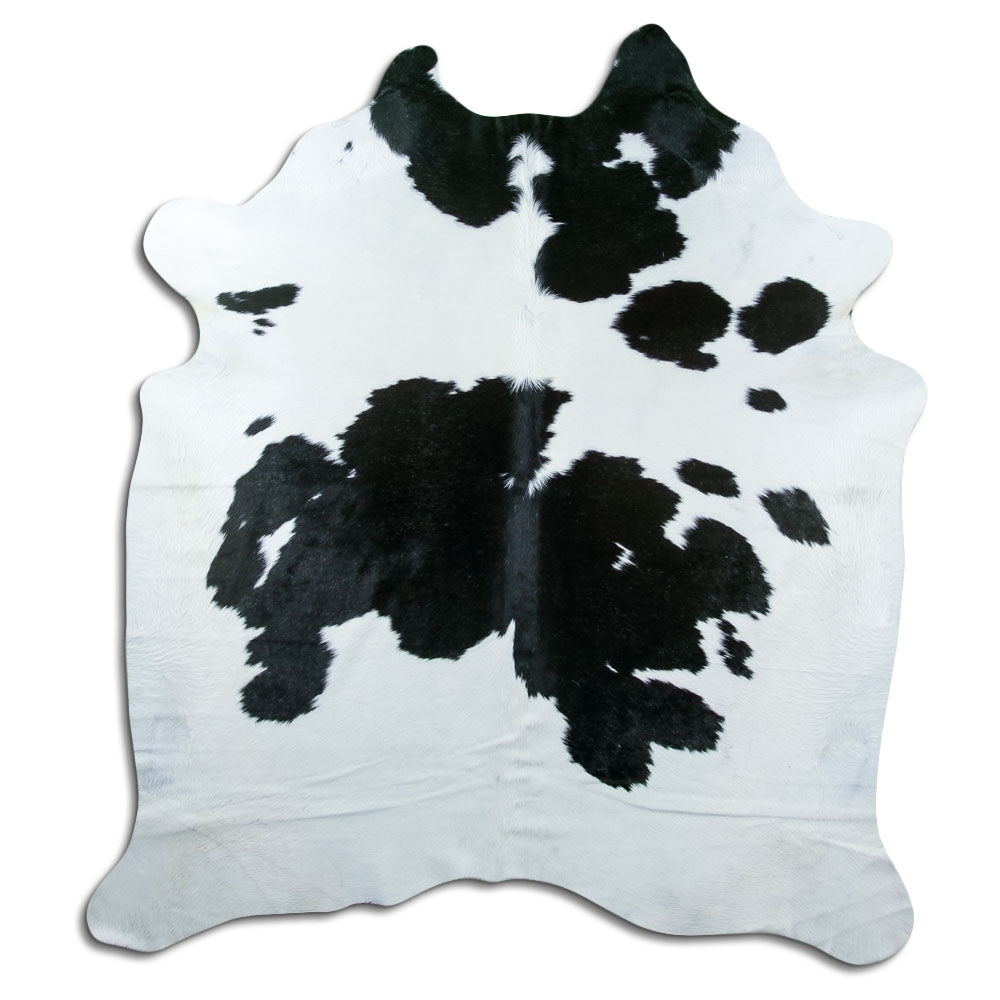 Zwart-witte koeienhuid, ongeveer 210 × 190 cm, van bovenaf gezien: precies de huid die je ontvangt