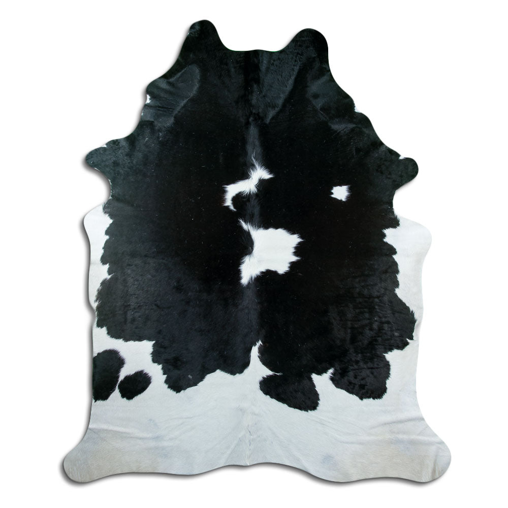 Zwart-witte koeienhuid, ongeveer 230 × 190 cm, van bovenaf gezien: precies de huid die je ontvangt