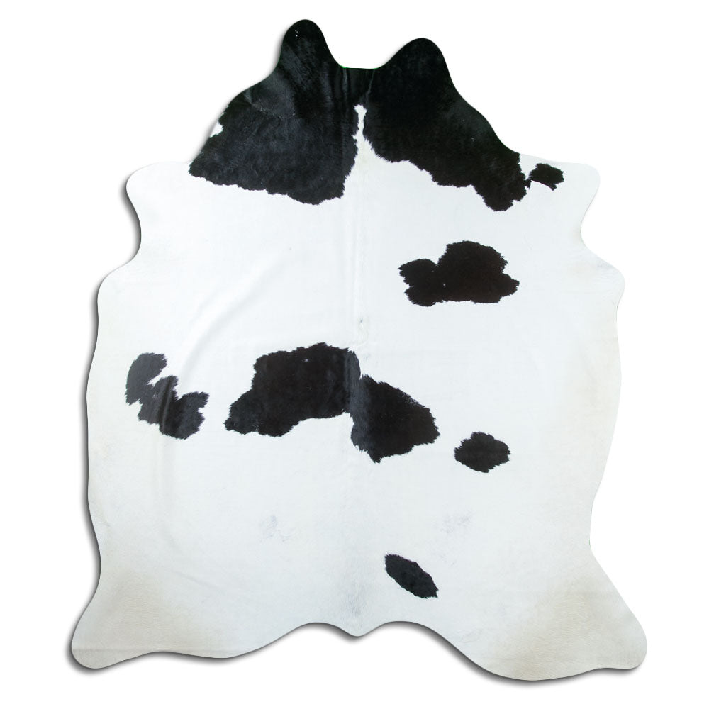 Zwart-witte koeienhuid, ongeveer 210 × 190 cm, van bovenaf gezien: precies de huid die je ontvangt