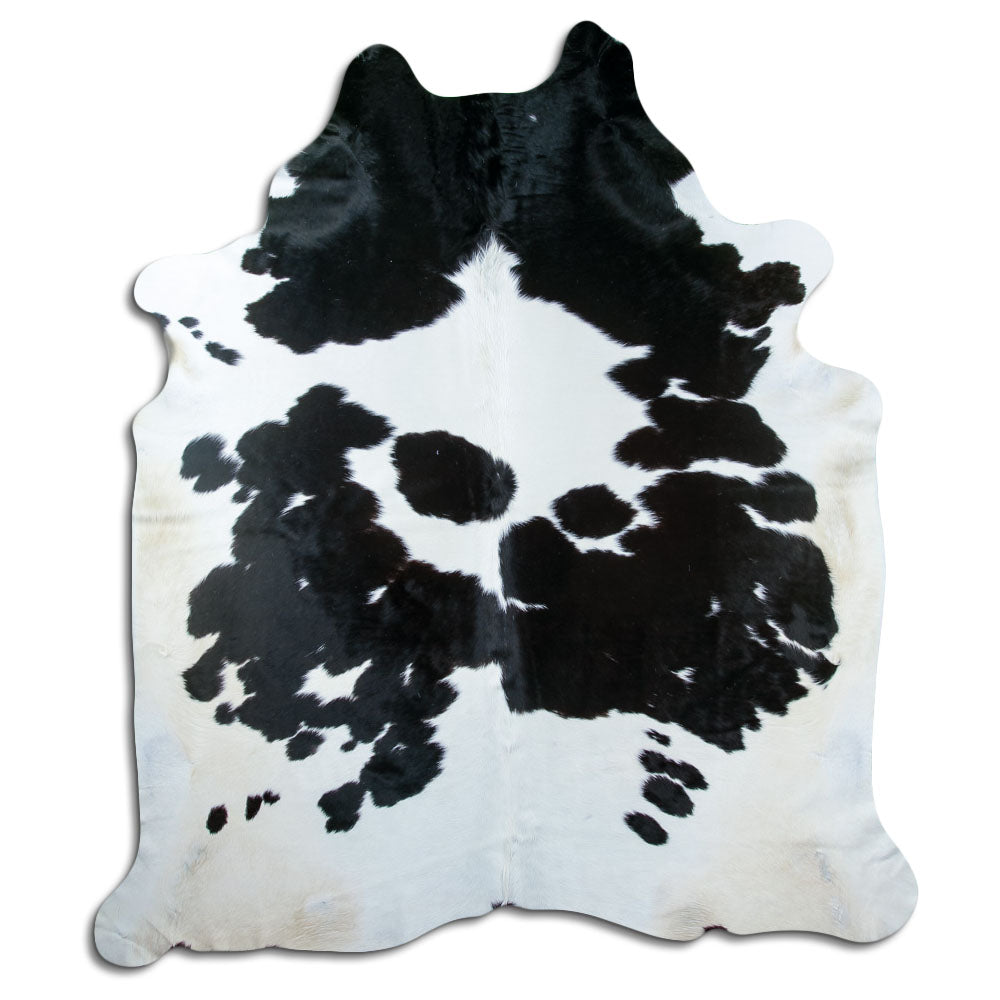 Zwart-witte koeienhuid, ongeveer 240 × 210 cm, van bovenaf gezien: precies de huid die je ontvangt