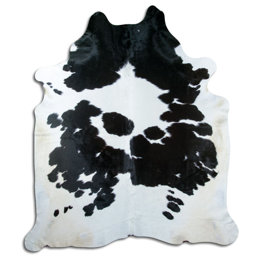Zwart-witte koeienhuid, ongeveer 240 × 210 cm, van bovenaf gezien: precies de huid die je ontvangt