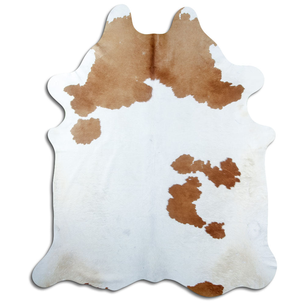 Bruin-witte koeienhuid, ongeveer 220 × 190 cm, van bovenaf gezien: precies de huid die je ontvangt