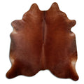 Bruine koeienhuid, ongeveer 210 × 200 cm, van bovenaf gezien: precies de huid die je ontvangt